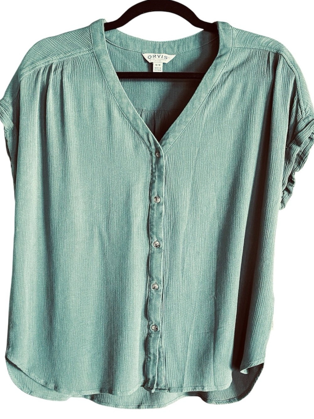Women's Orvis front button blouse in Sage green with cap sleeves and casual fit.